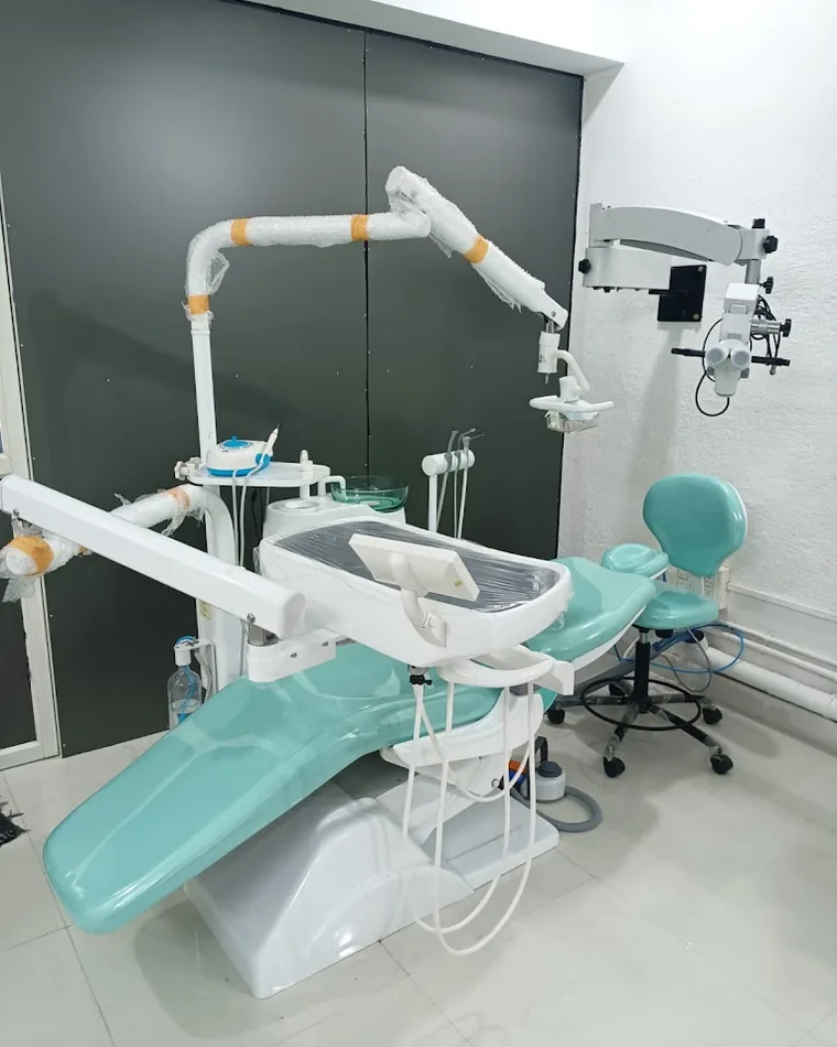 Treatment room at Dr Teeth Clinics with a surgical operating microscope